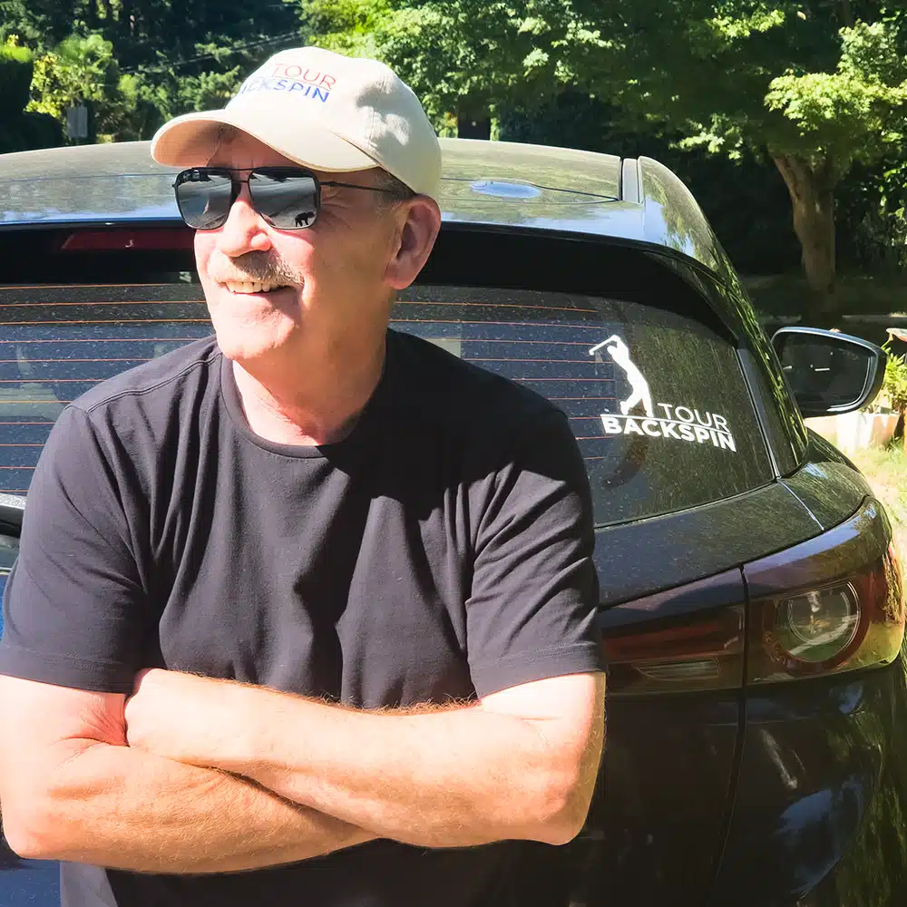 A picture of the Tour Backspin Bio-Washed Dad Hat on a model